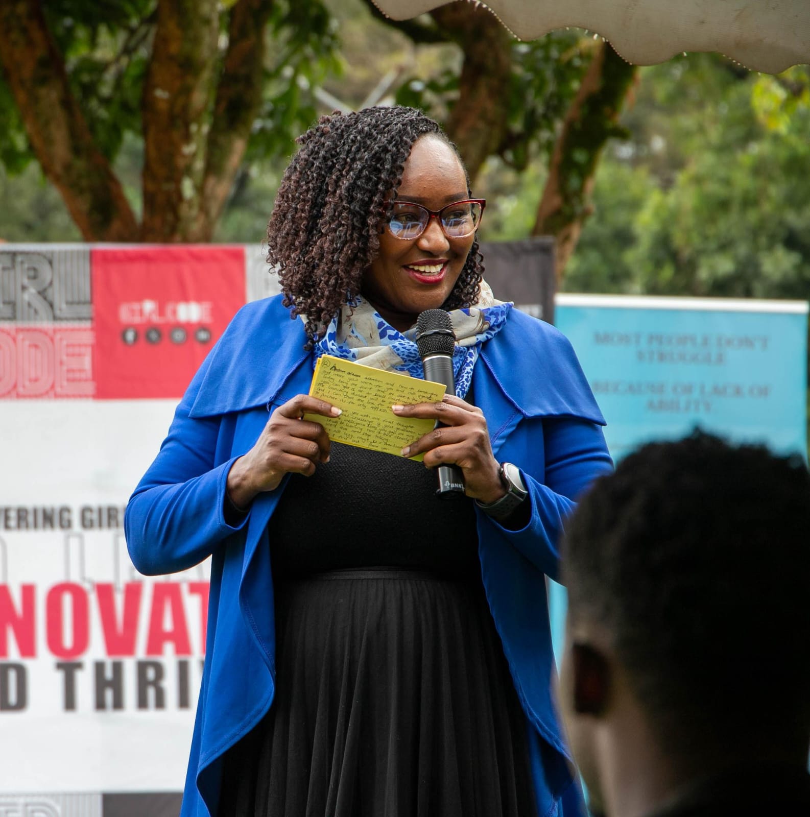 Catherine Gatwiri speaking at Girl Code Innovate and Thrive Summit