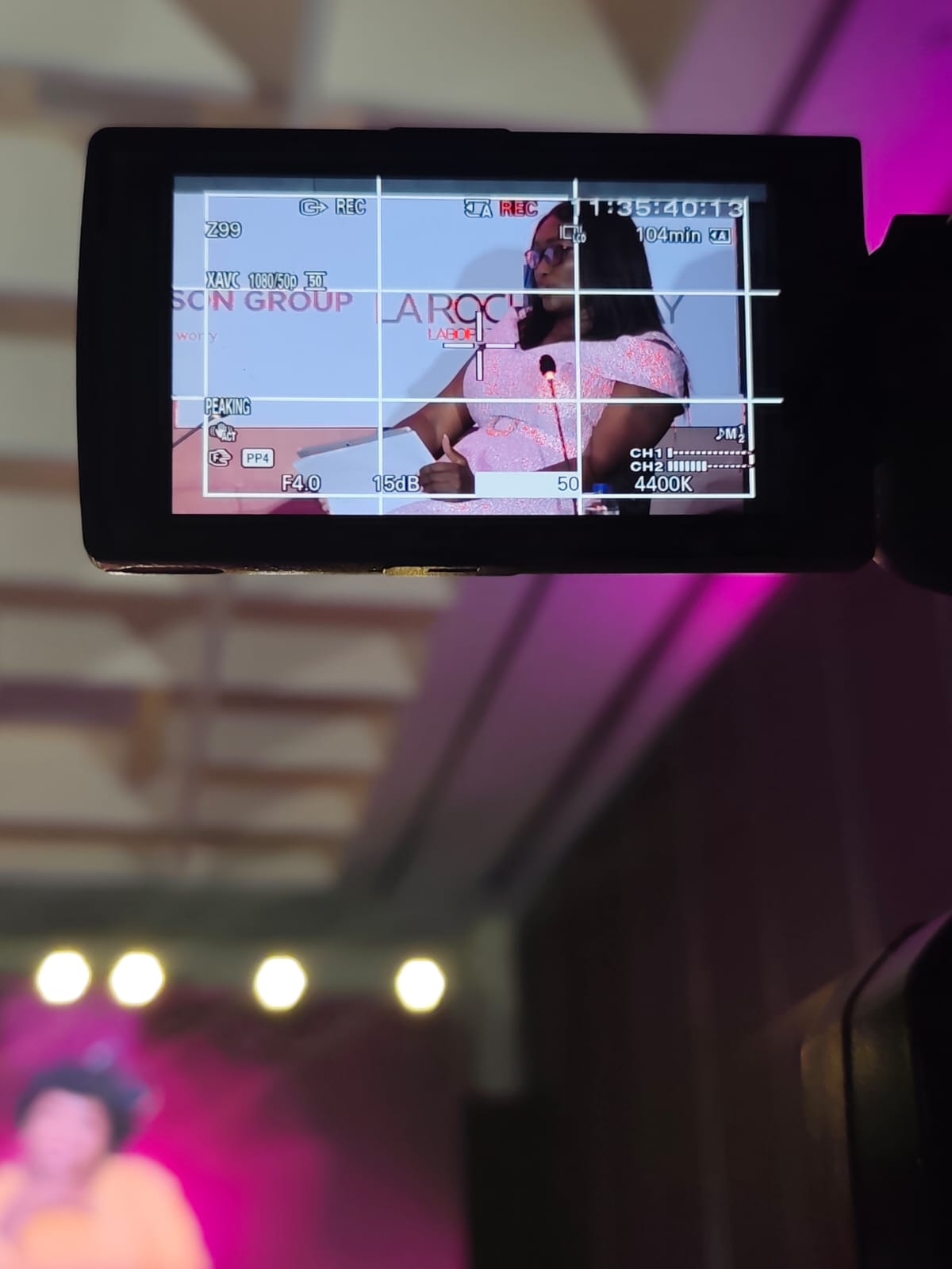 Camera monitor recording panel discussion at What Women Want Summit